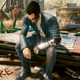 Keanu Reeves look-a-like Johnny Silverhand sits despondently atop a pile of garbage.